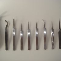 A selection of Swiss style stainless steel forceps and tweezers